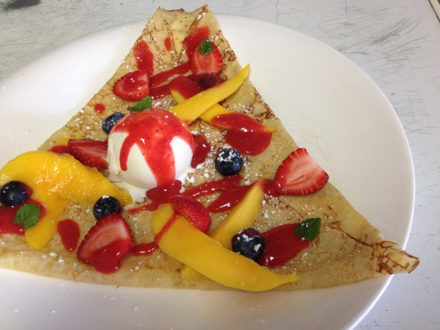 Mango. blueberry and strawberry sweet crêpe. 